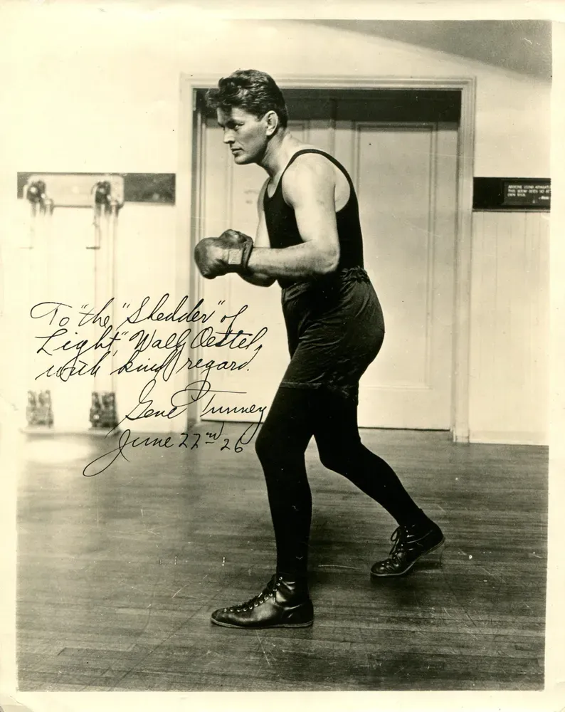 8a3e051c-b741-4738-adf5-bbb738897003-gene-tunney-signed-photo-60117.webp